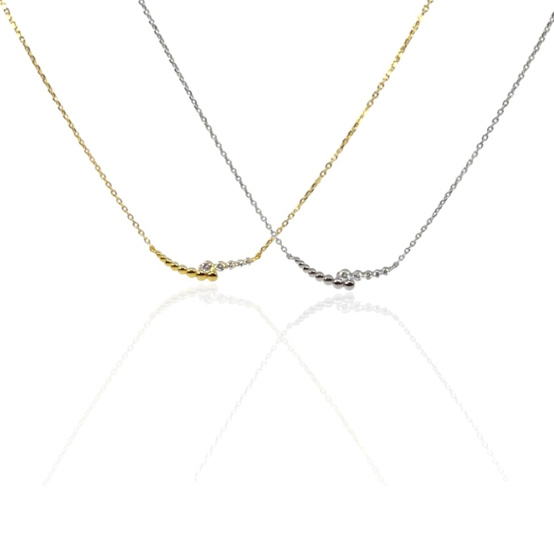 Collana sfere lisce e zirconi